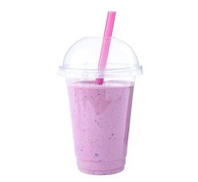 Tasty fresh milk shake in plastic cup on white background