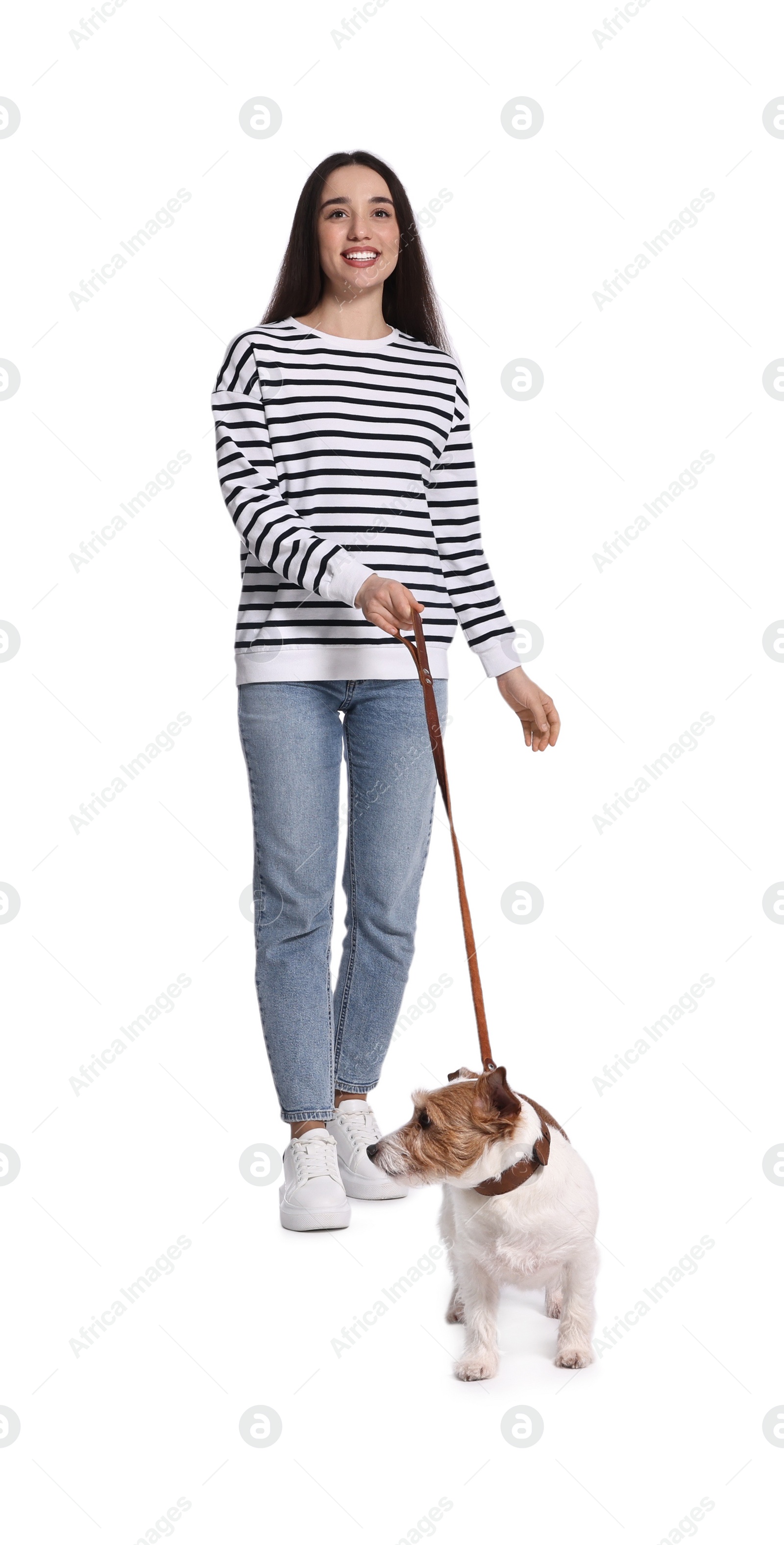 Photo of Smiling woman walking her dog on white background