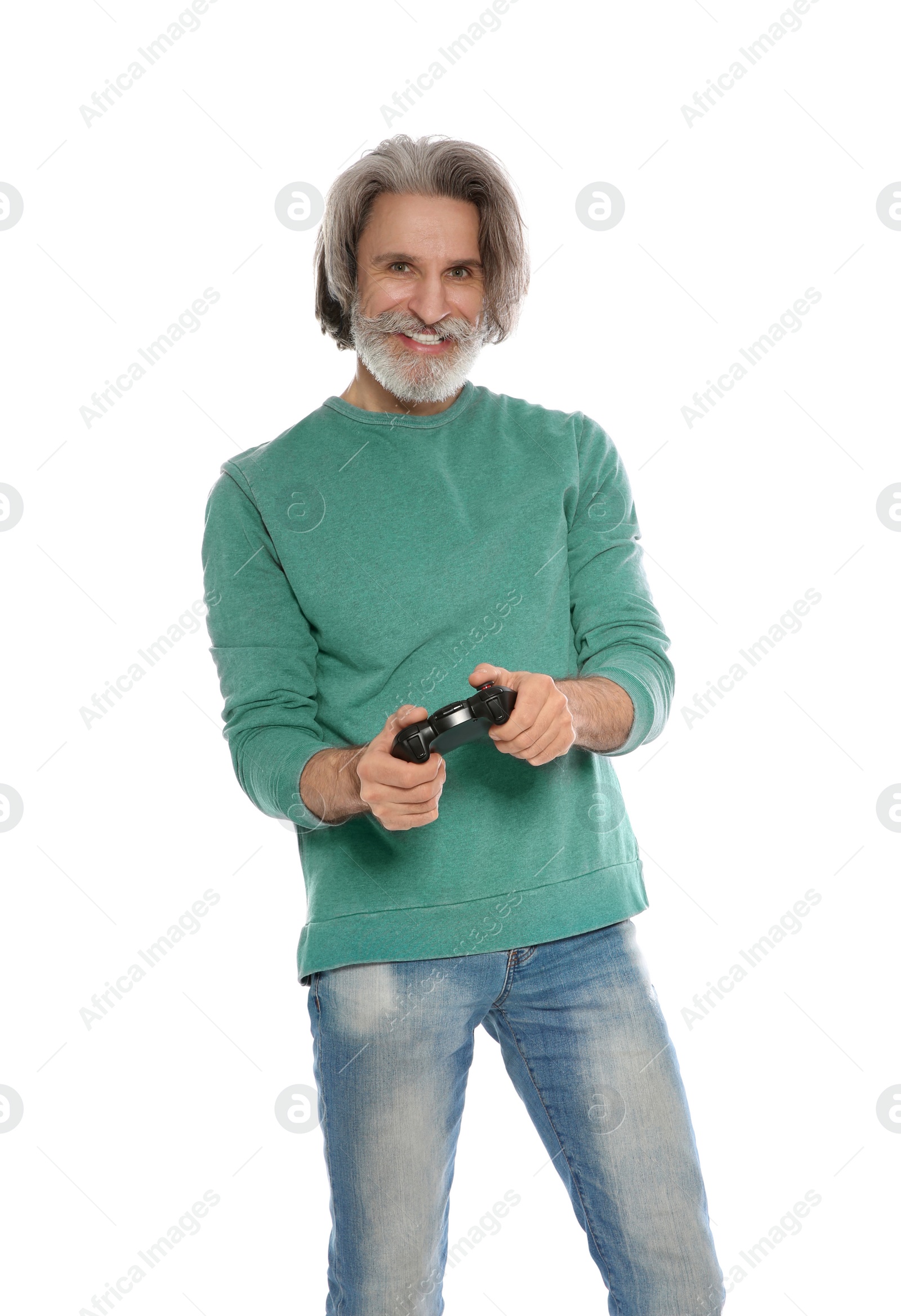 Photo of Emotional mature man playing video games with controller isolated on white