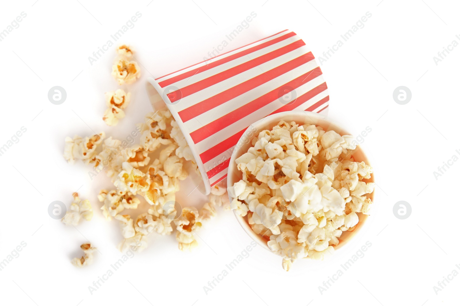 Photo of Buckets of tasty pop corn isolated on white, top view
