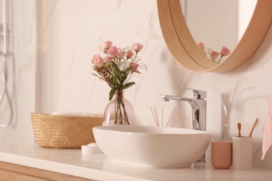 Photo of Modern bathroom interior with stylish mirror and vessel sink