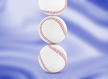 Image of Stack of baseball balls on blue background