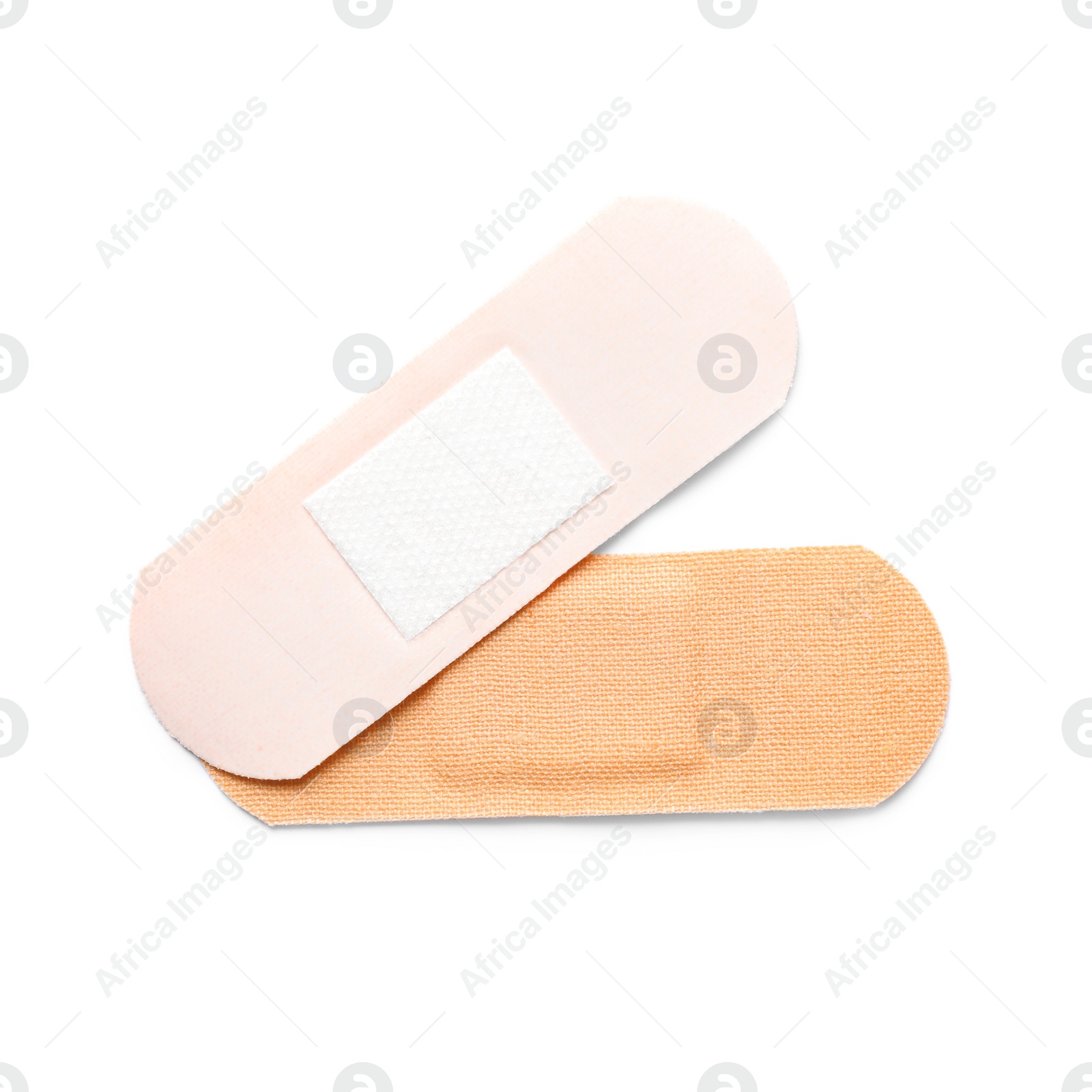 Medical sticking plasters isolated on white. First aid item Photo of Medical sticking plasters isolated on white. First aid item