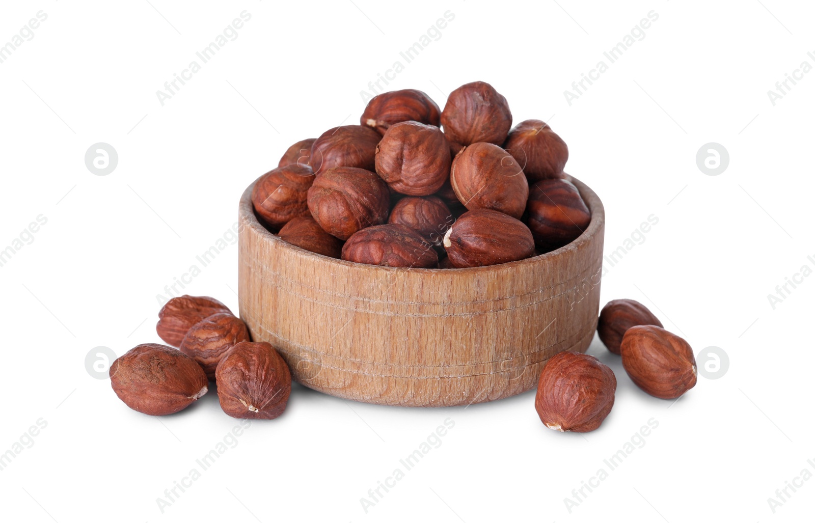 Photo of Bowl of delicious hazel nuts isolated on white