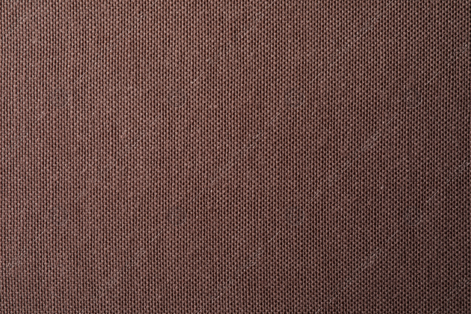 Photo of Texture of brown fabric as background, top view