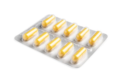Photo of Blister with bright pills isolated on white