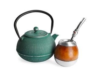 Photo of Calabash with mate tea, bombilla and teapot on white background