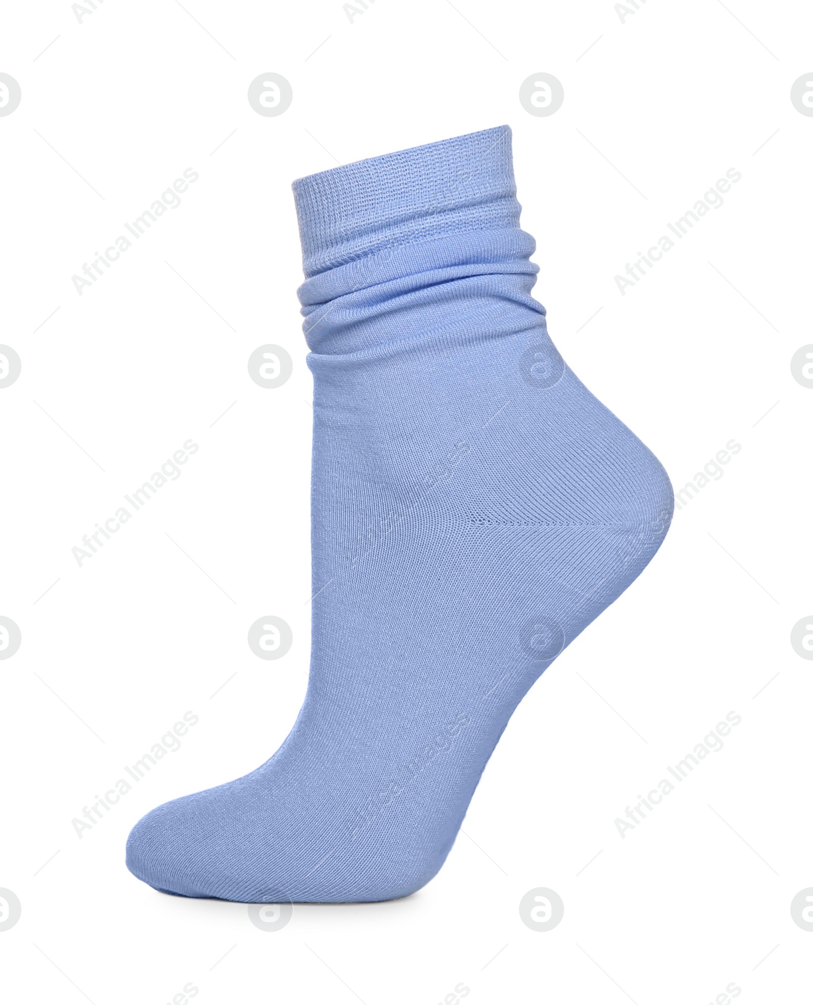 Photo of Light blue sock isolated on white. Footwear accessory