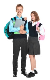 Happy pupils in school uniform on white background