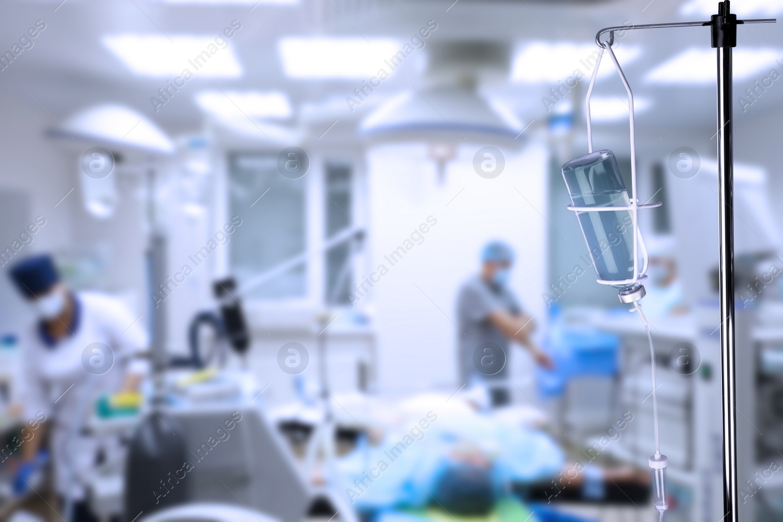 Image of Drop counter with bottle of medicine in operating room. Space for text