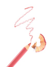 Photo of Bright lip liner stroke, pencil and shaving on white background, top view