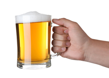 Man holding glass mug with beer on white background, closeup