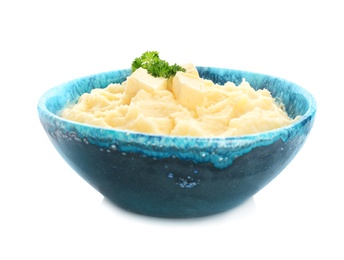 Photo of Bowl with tasty mashed potatoes on white background