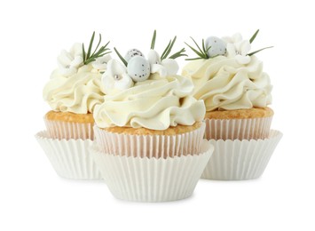 Tasty Easter cupcakes with vanilla cream isolated on white