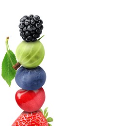 Stack of different fresh tasty berries and cherry on white background