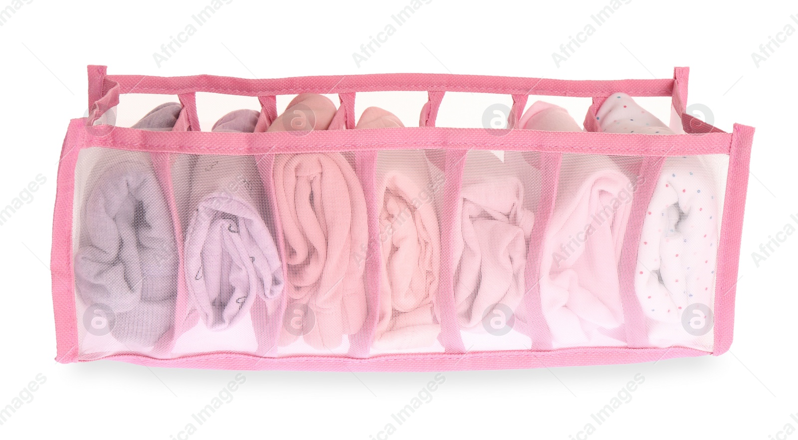 Photo of Transparent organizer with folded clothes isolated on white