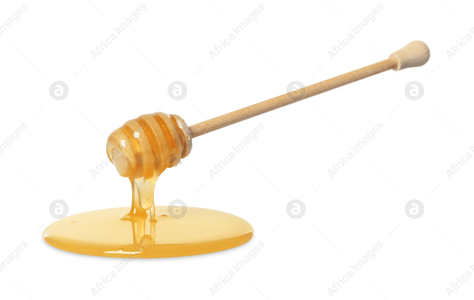 Photo of Natural honey dripping from dipper on white background