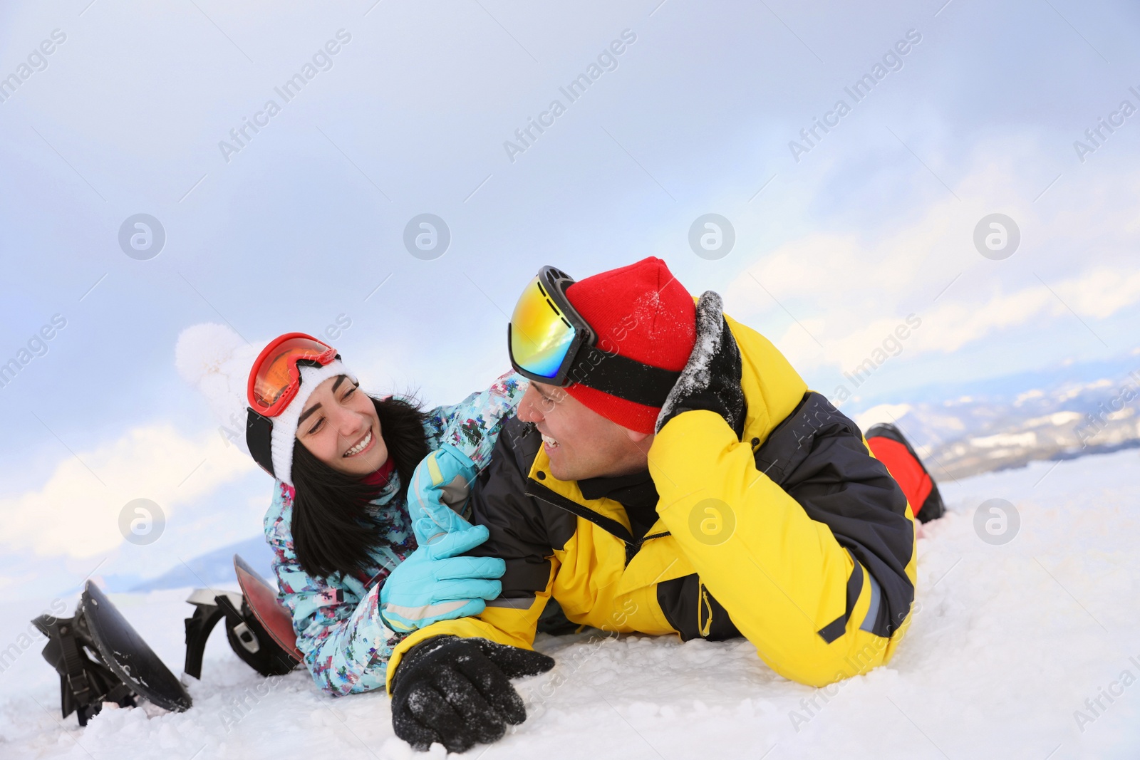 Photo of Lovely couple on snowy hill. Winter vacation