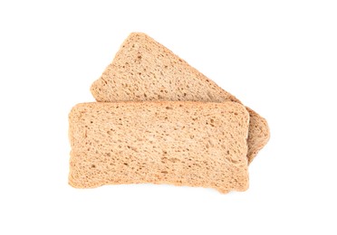 Photo of Fresh rye crispbreads isolated on white, top view