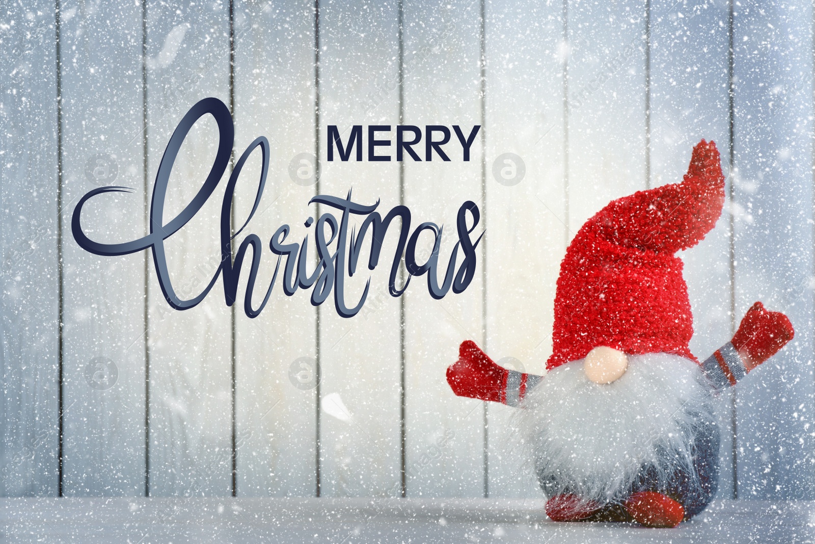 Image of Merry Christmas! Cute gnome on table against white wooden background