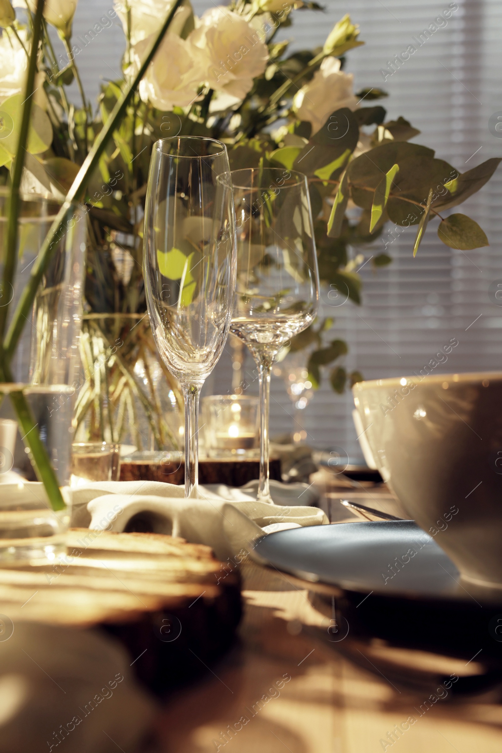 Photo of Festive table setting with beautiful tableware and decor indoors