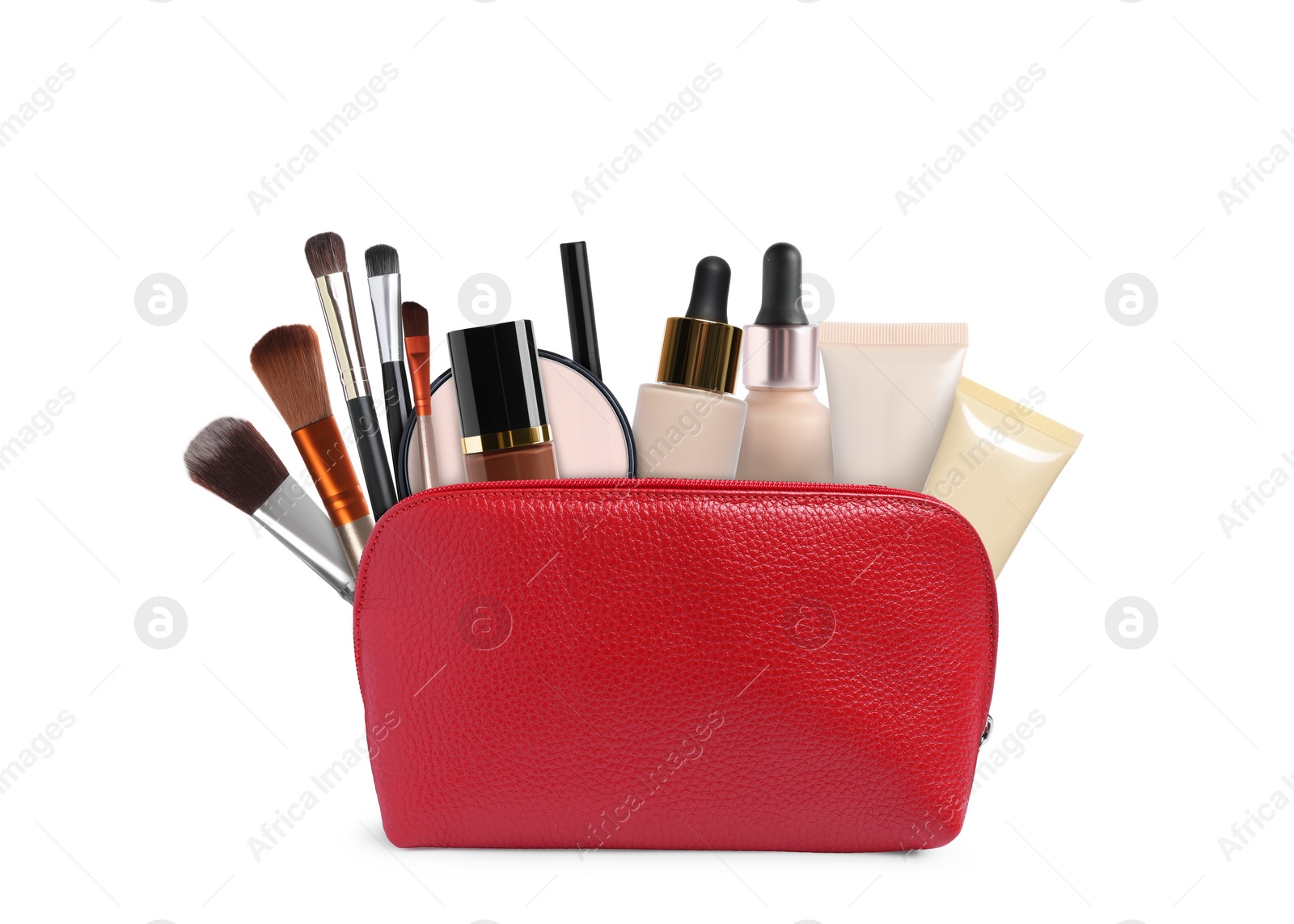 Image of Cosmetic bag filled with makeup products on white background