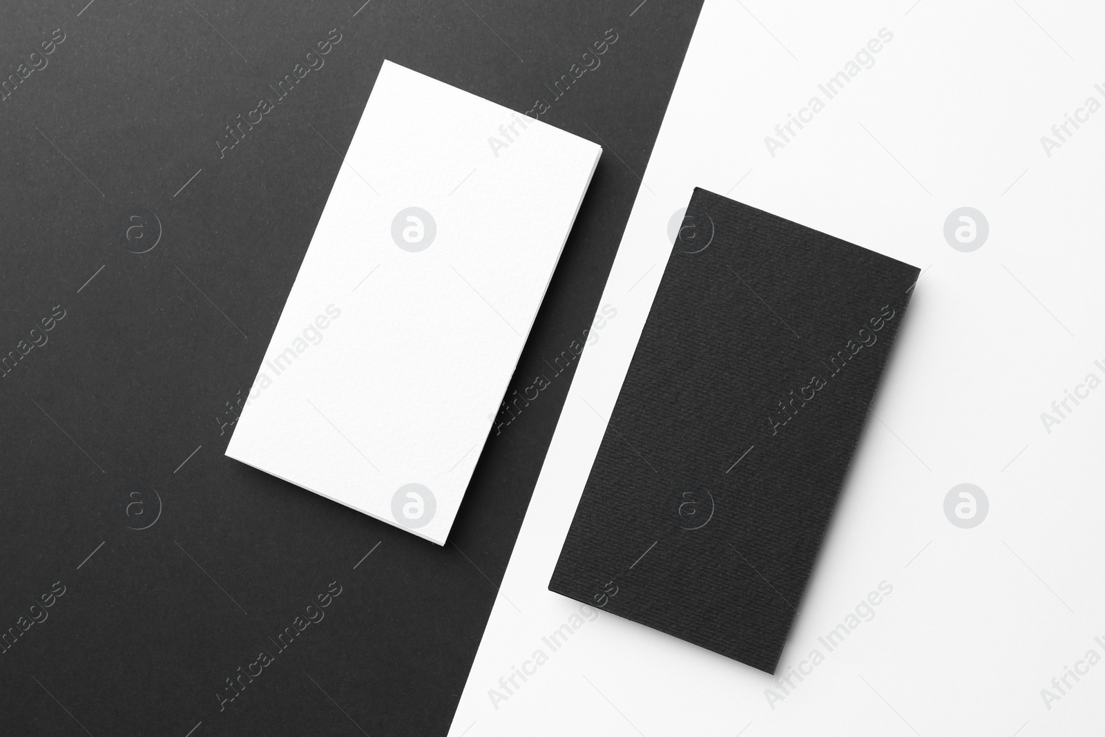 Photo of Blank business cards on color background, flat lay. Mockup for design