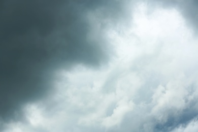 Sky with heavy rainy clouds on grey day