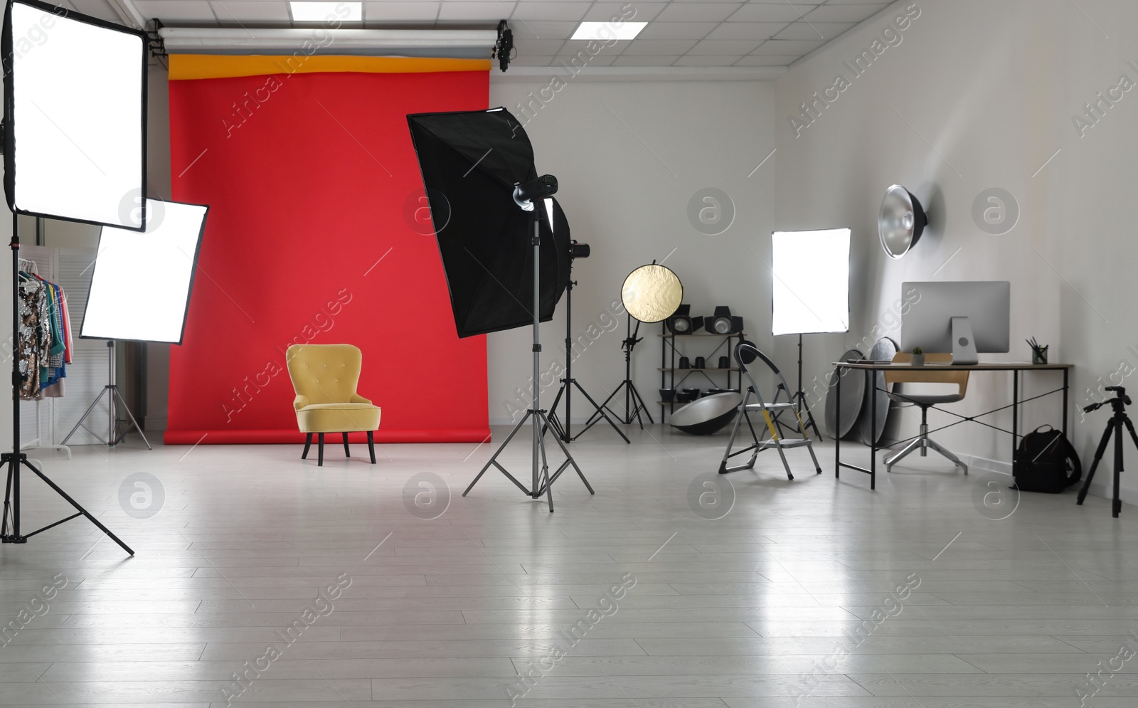 Photo of Interior of modern photo studio with professional equipment