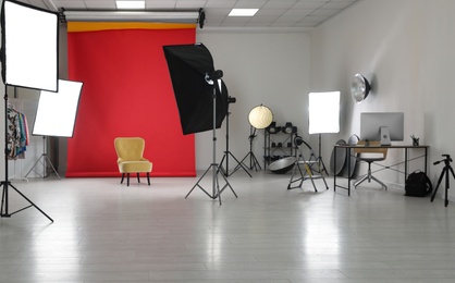 Interior of modern photo studio with professional equipment