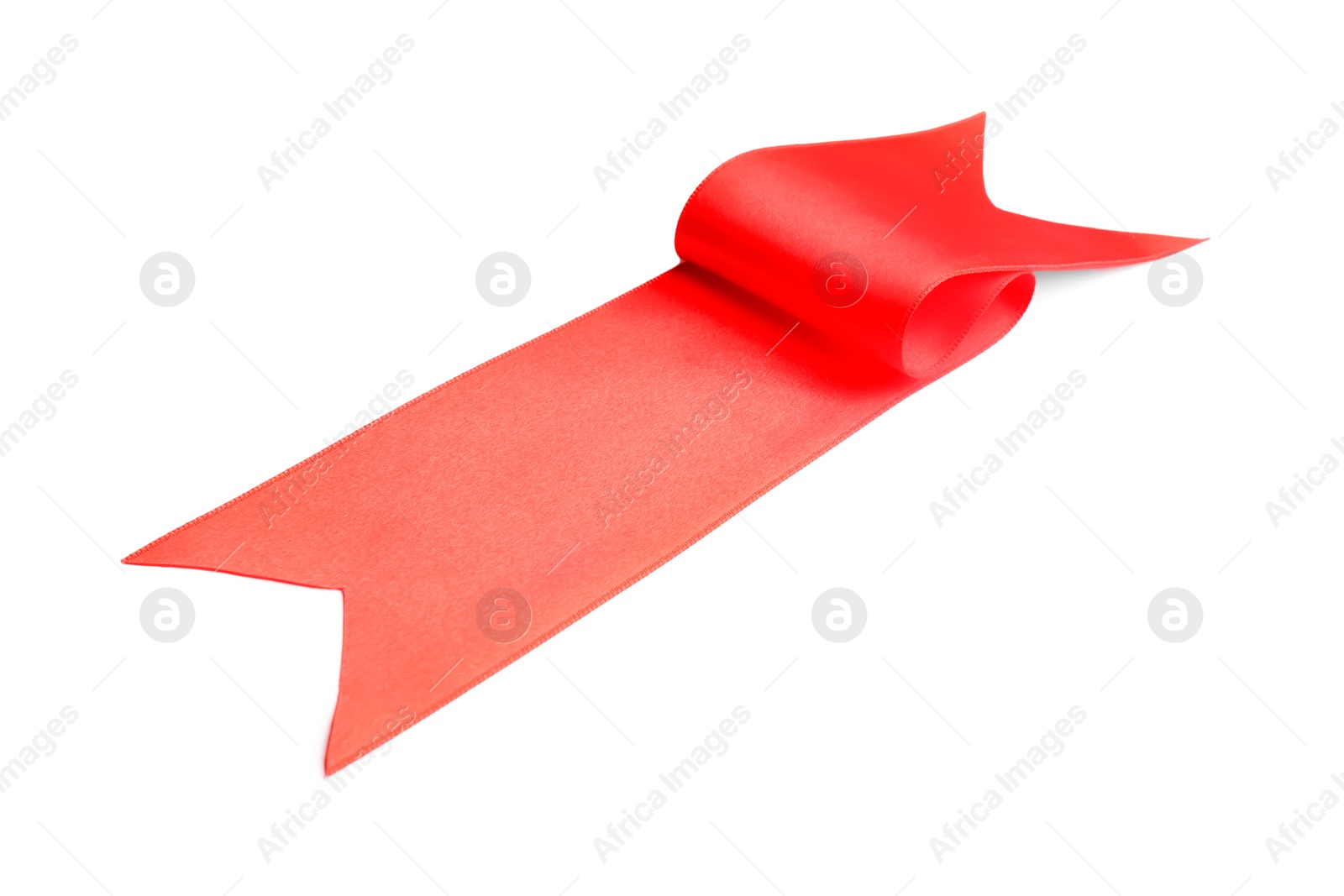 Photo of Simple red ribbon on white background. Festive decoration