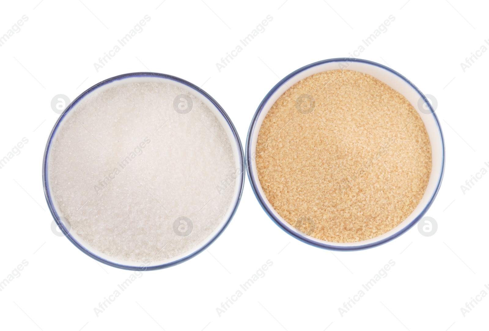 Photo of Bowls with different granulated sugar on white background, top view