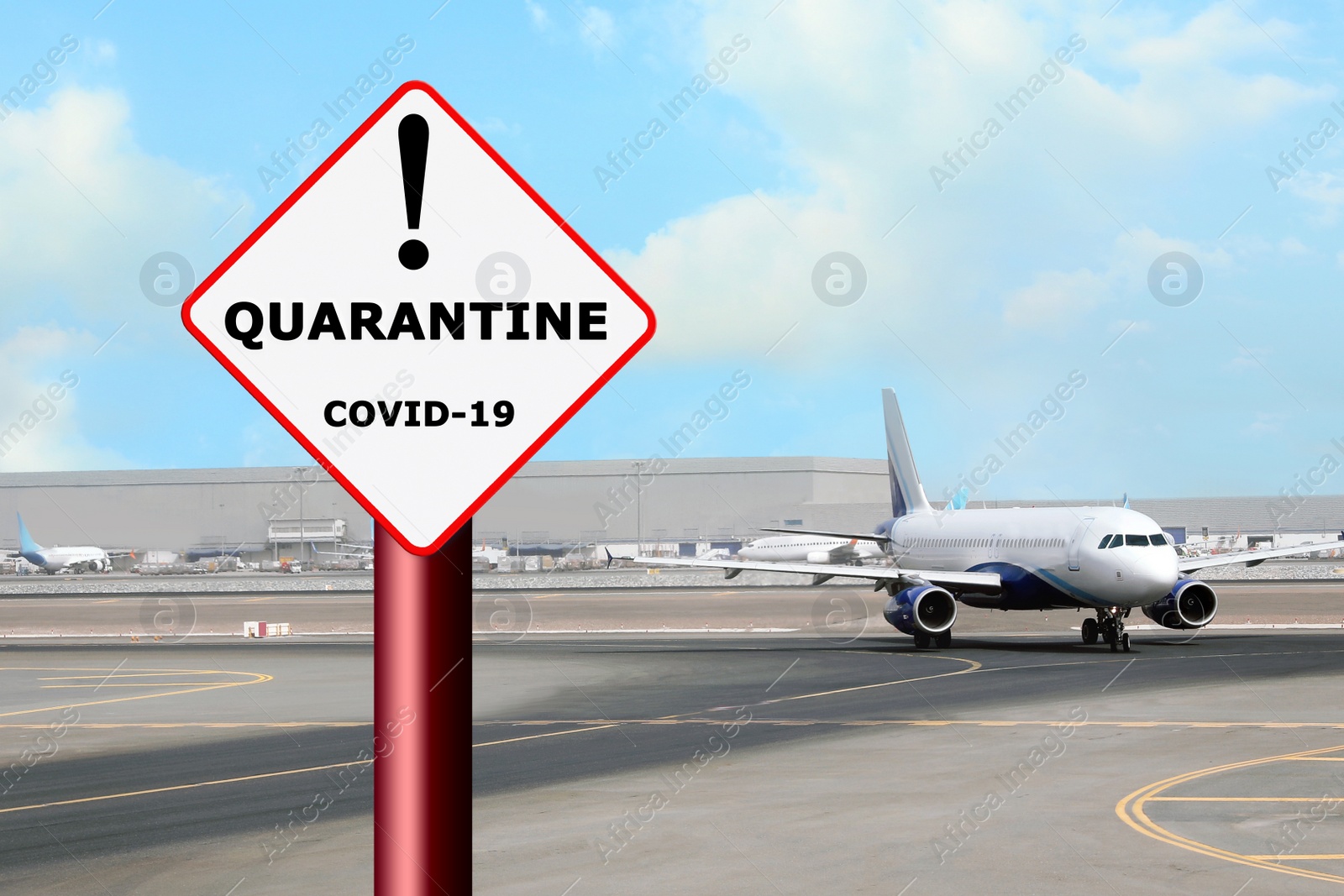 Image of Closure of air traffic during coronavirus outbreak. Airplane and warning sign with inscription QUARANTINE