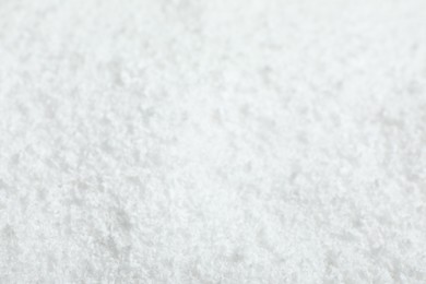 Pile of white snow as background, closeup view