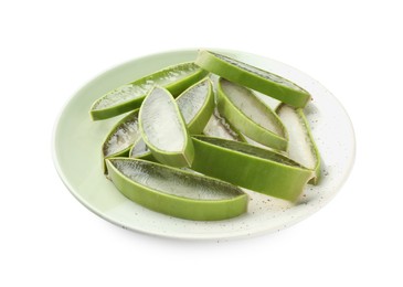 Photo of Plate with fresh aloe vera slices isolated on white