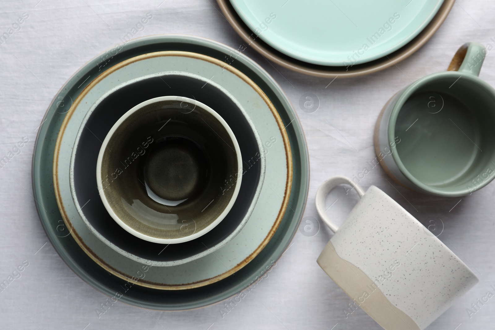 Photo of Stylish empty dishware on table, flat lay