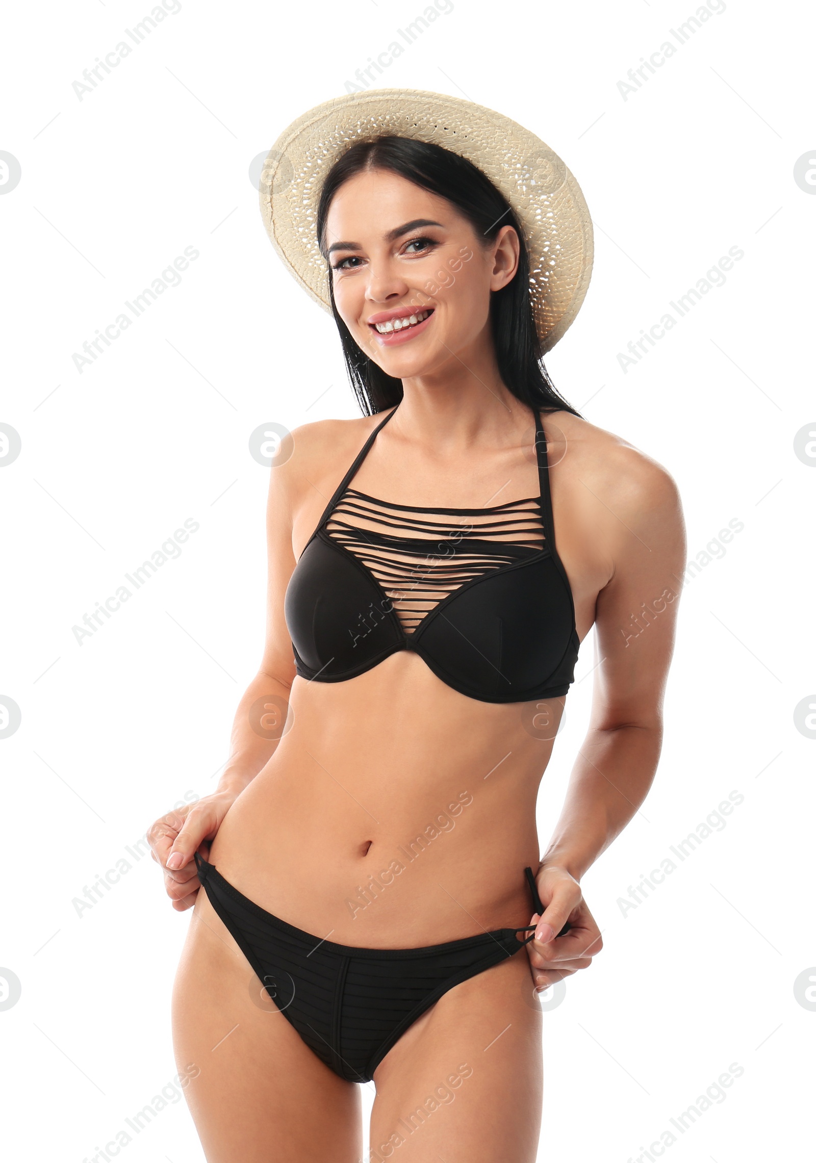 Photo of Beautiful young woman in black bikini with hat on white background