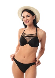 Beautiful young woman in black bikini with hat on white background