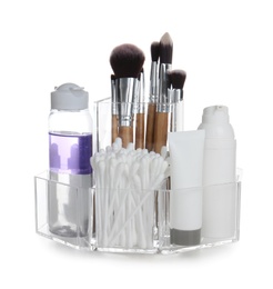 Photo of Cosmetic products in organizer on white background