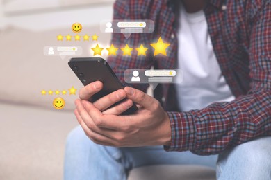 Man leaving service feedback with smartphone outdoors, closeup. Stars and emoticons near device