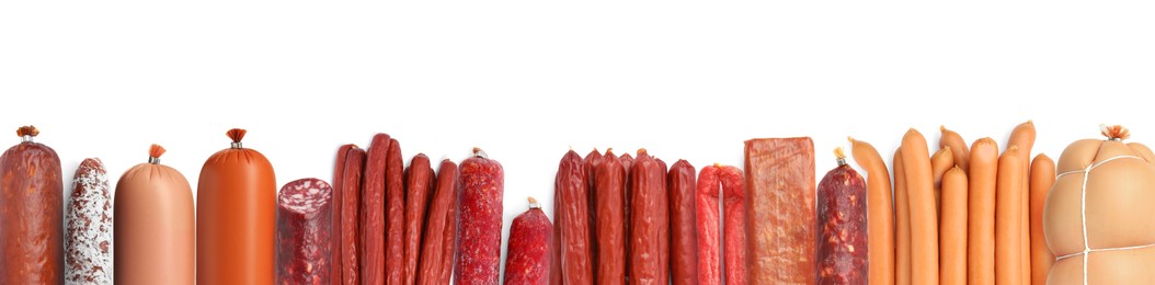 Image of Many different tasty sausages on white background, top view. Banner design