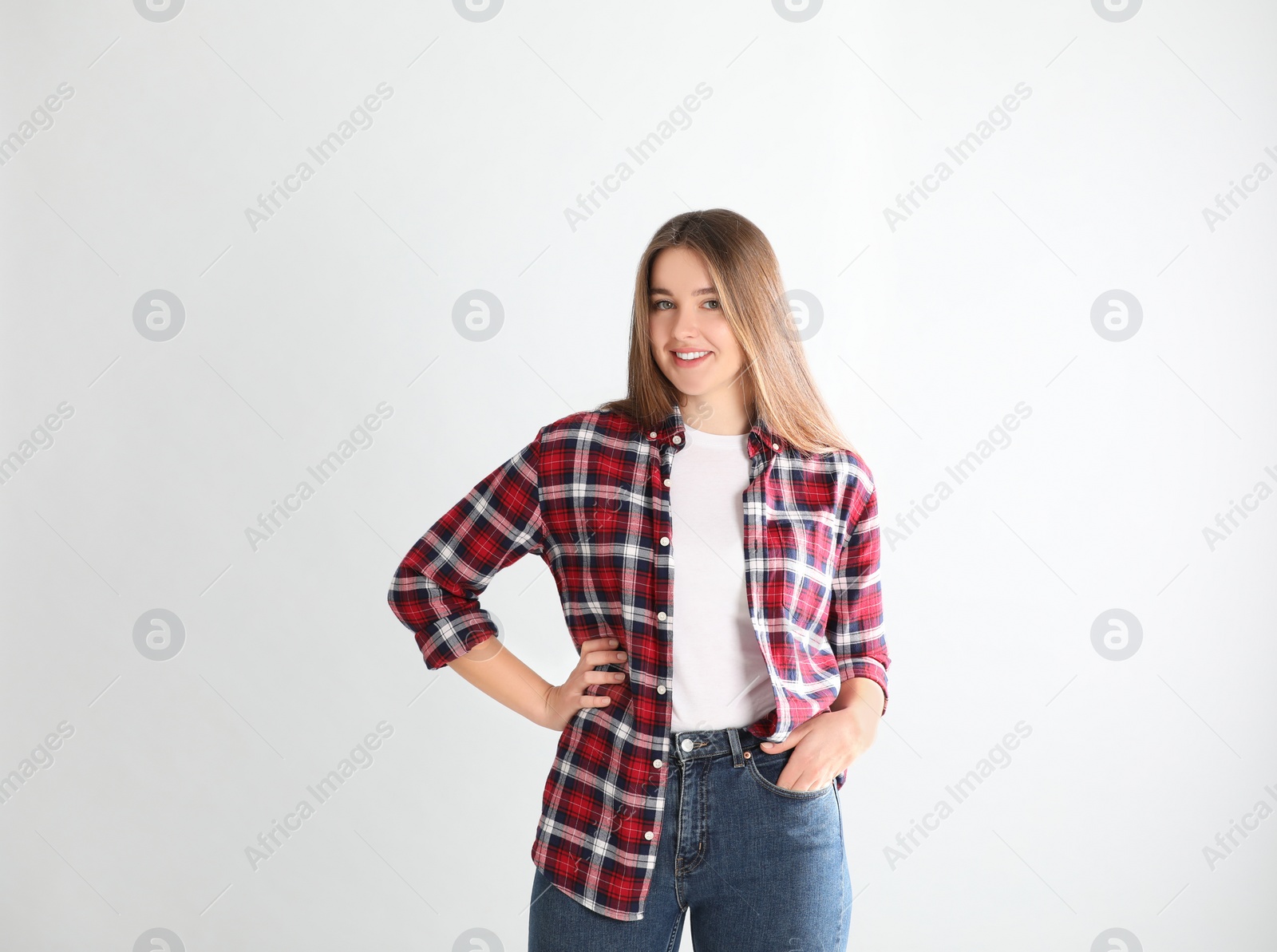 Photo of Portrait of young woman on white background