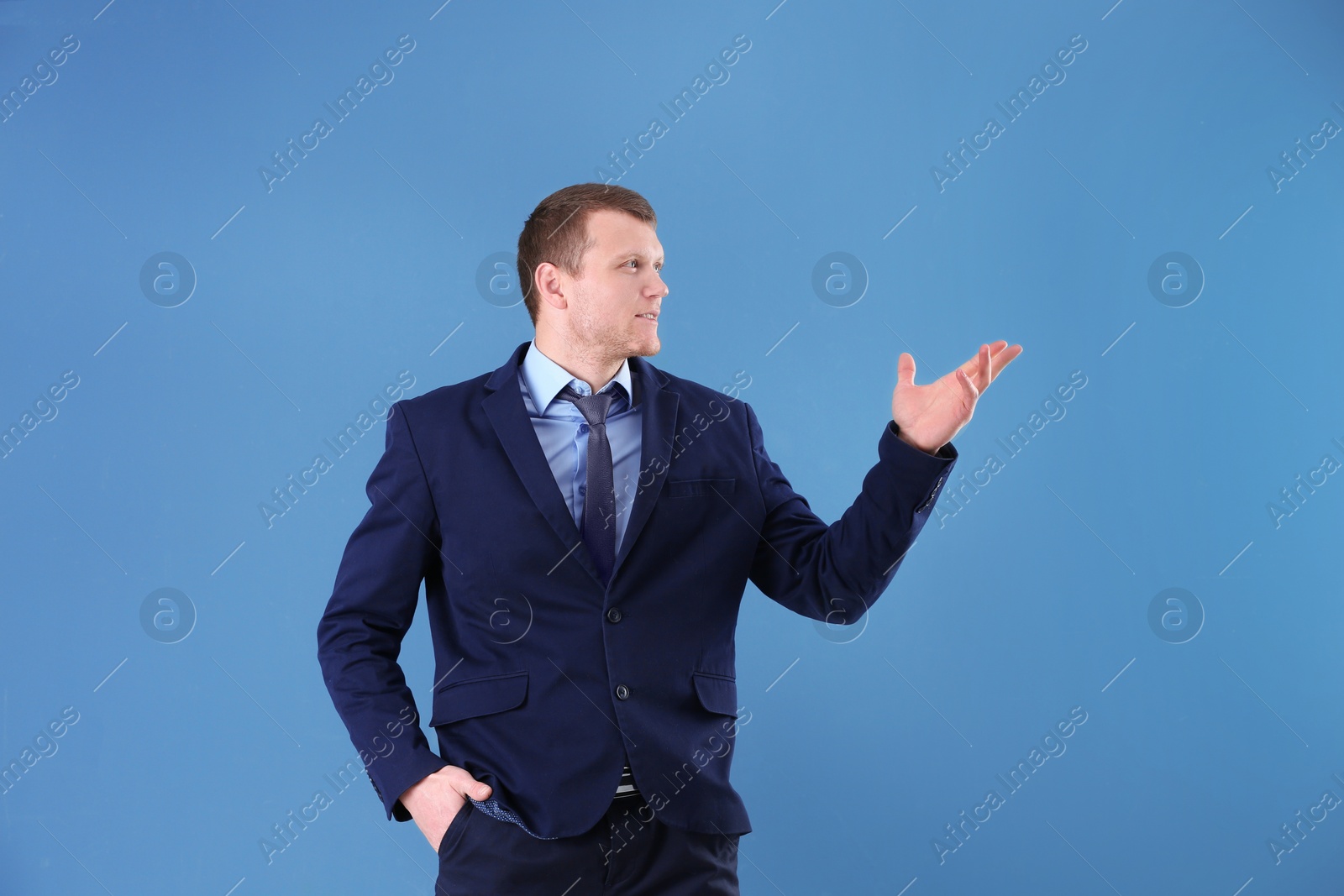 Photo of Business trainer explaining seminar on color background