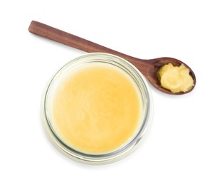 Glass jar and spoon of Ghee butter isolated on white, top view