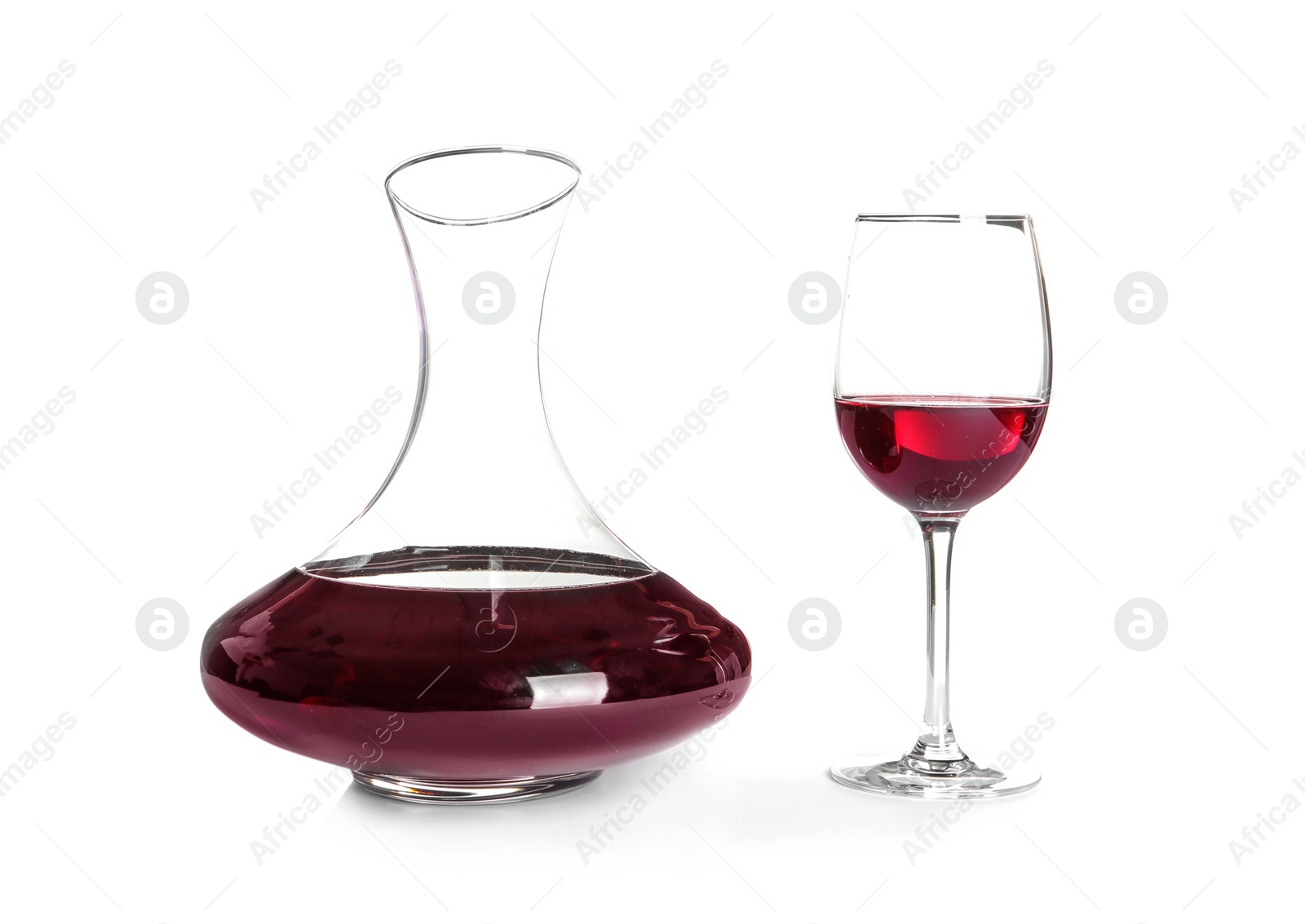 Photo of Elegant decanter and glass with red wine on white background
