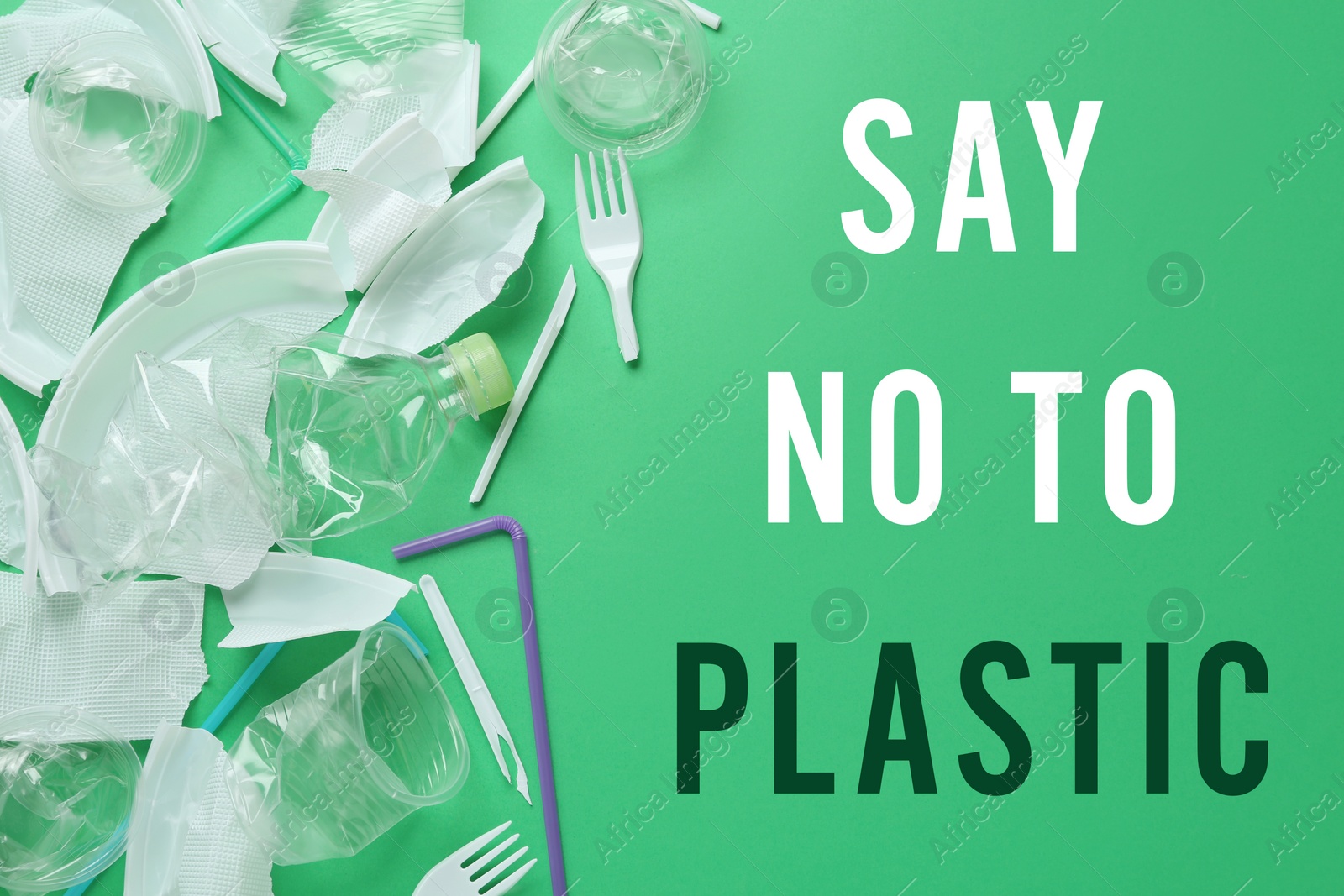 Image of Text SAY NO TO PLASTIC and disposable items on green background, flat lay