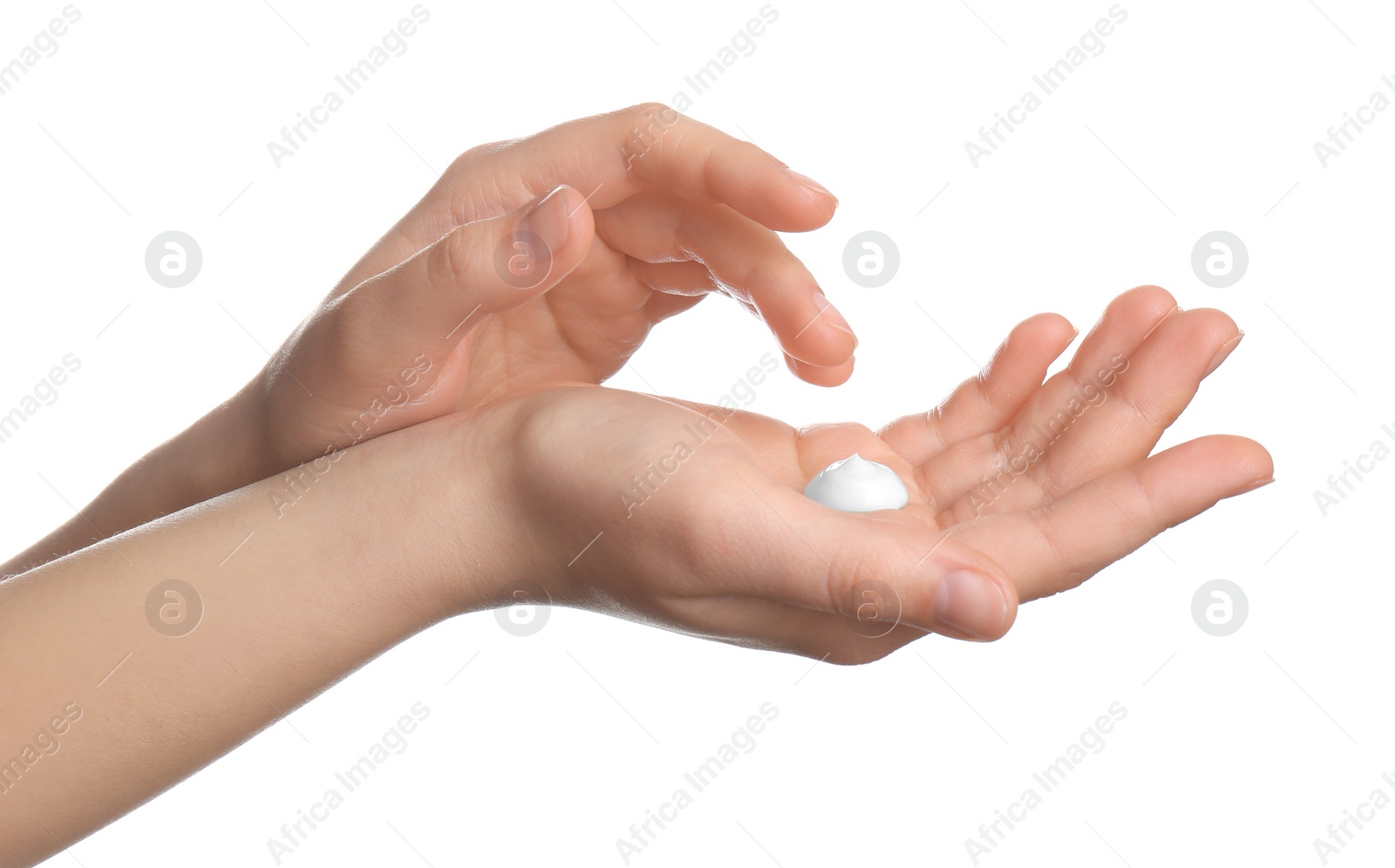 Photo of Woman applying cream onto hands isolated on white, closeup