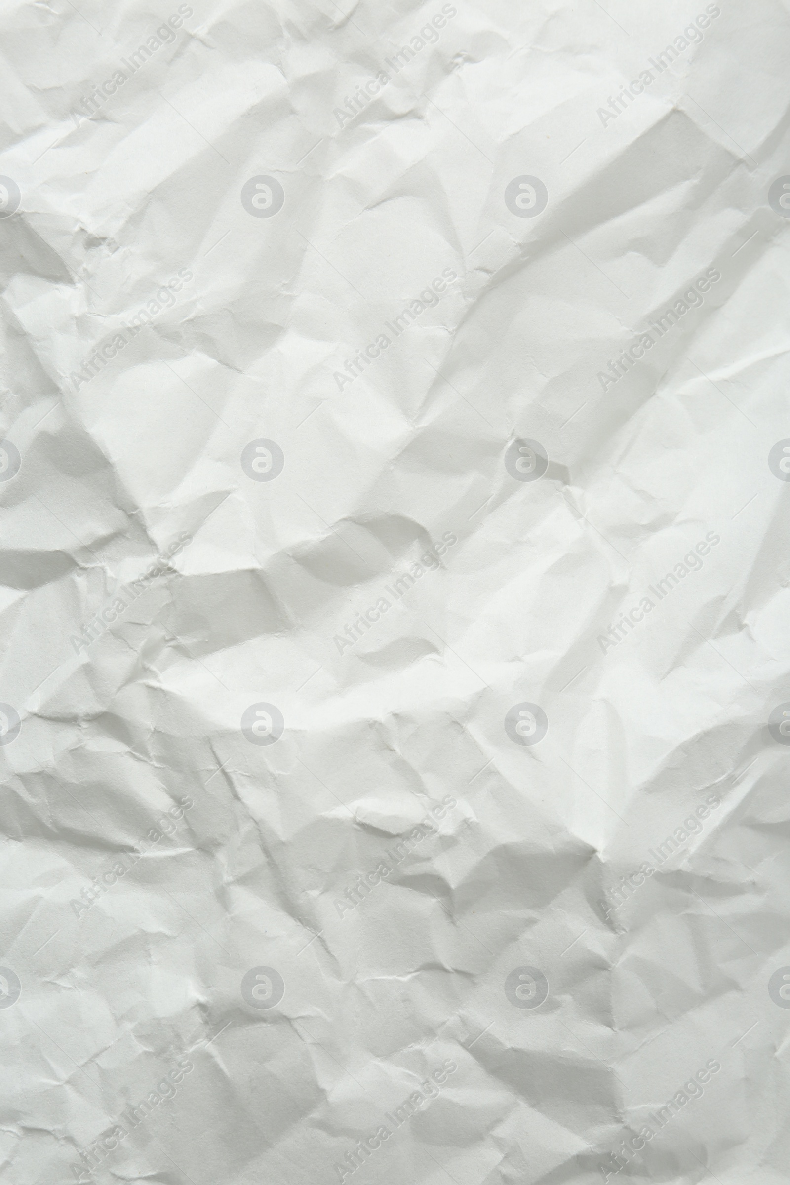 Photo of Crumpled notebook sheet as background, top view