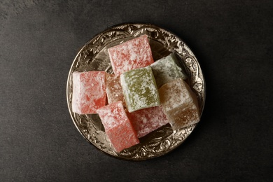 Turkish delight dessert on dark table, top view