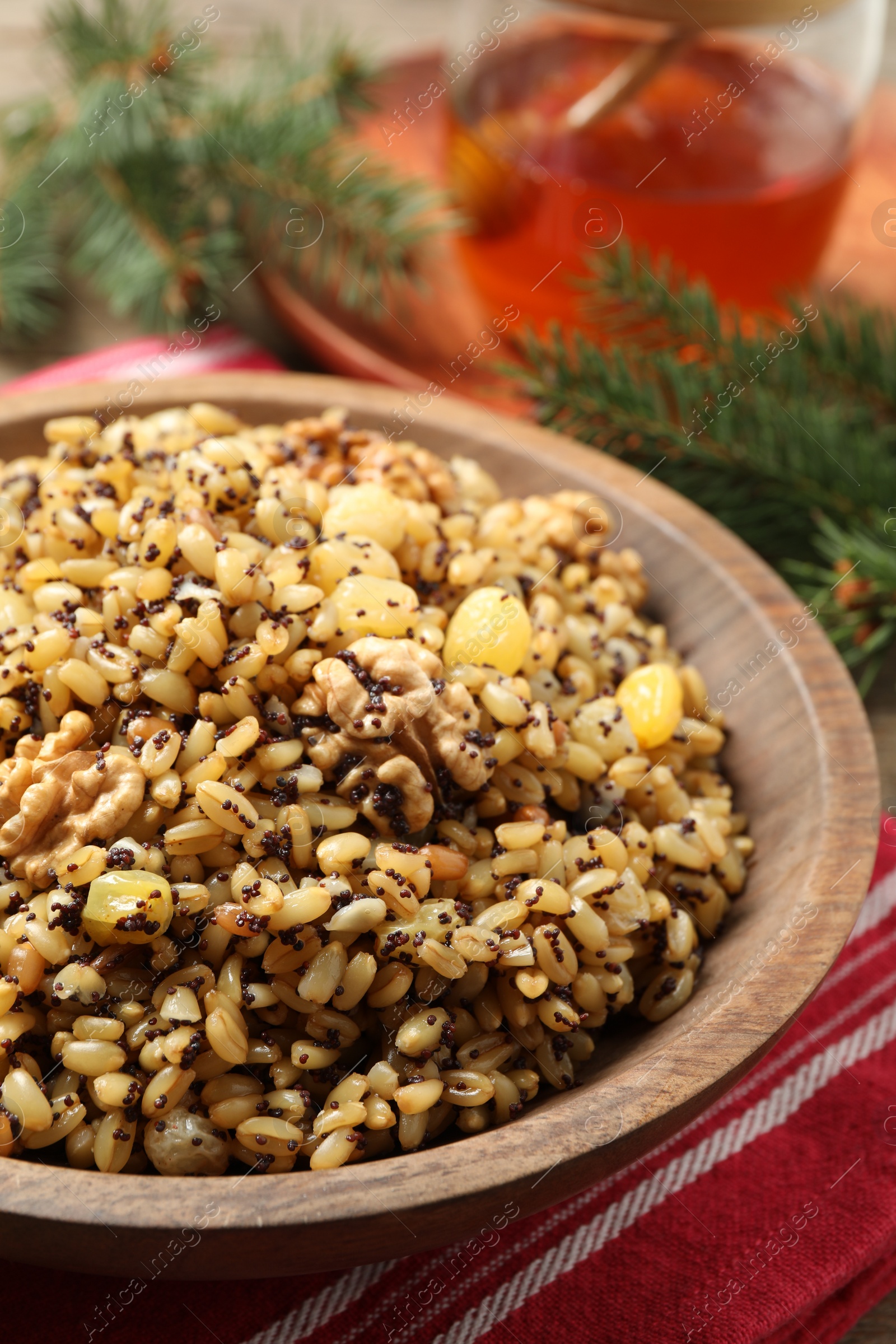 Photo of Traditional Christmas slavic dish kutia in bowl, closeup